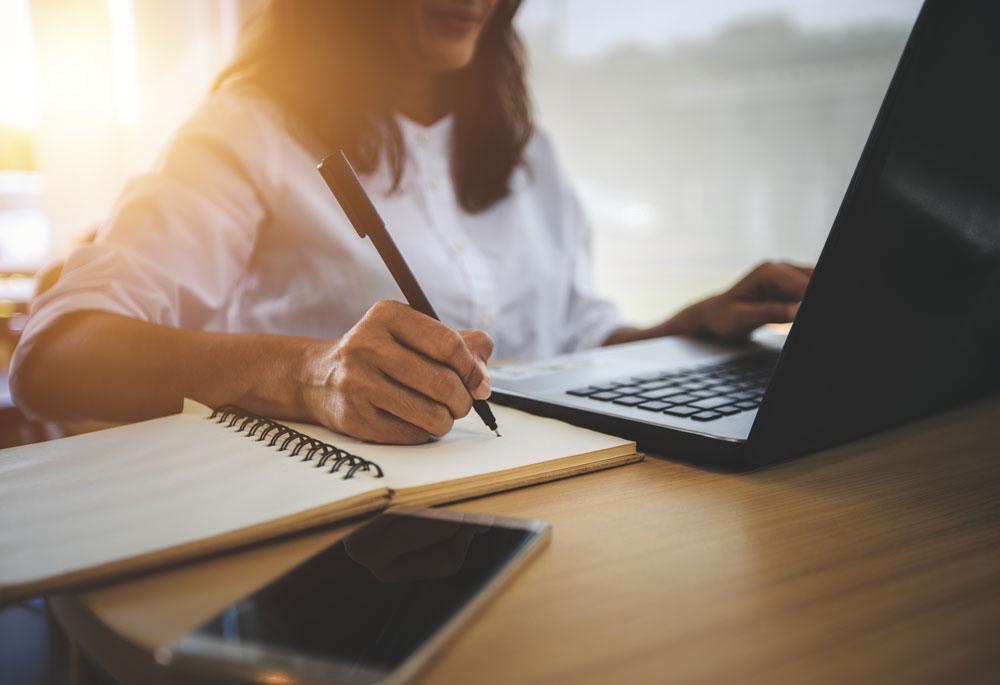 A woman learning on a computer